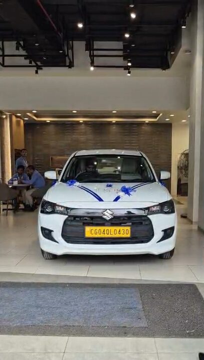 White Maruti Suzuki Dzire outstation taxi